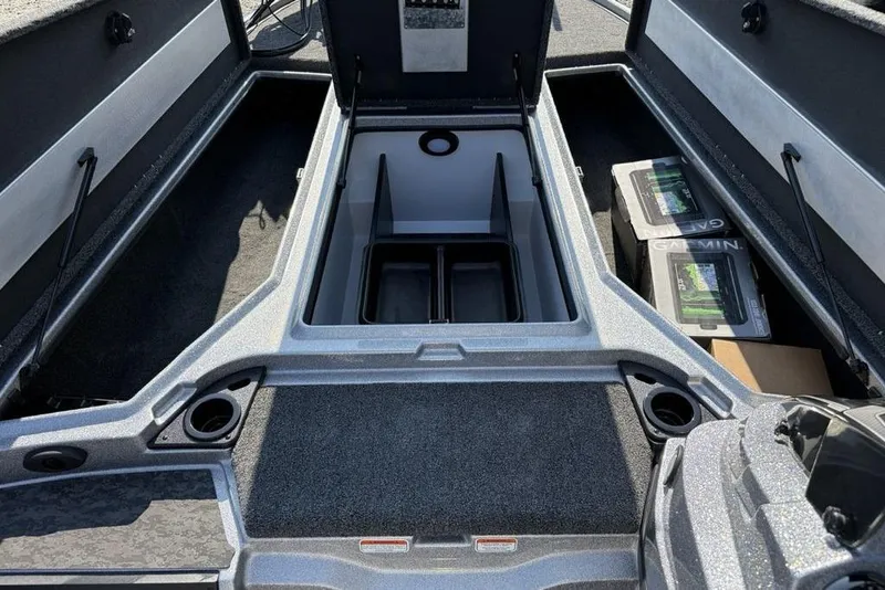 Slide: The Image of 2026 Nitro Z20 XL Pro boat interior with storage compartments and Garmin equipment. - 9
