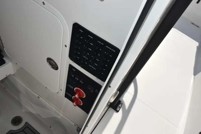 Slide: The Image of Control panel on 2026 Sea Hunt Ultra 275 SE boat interior. - 16