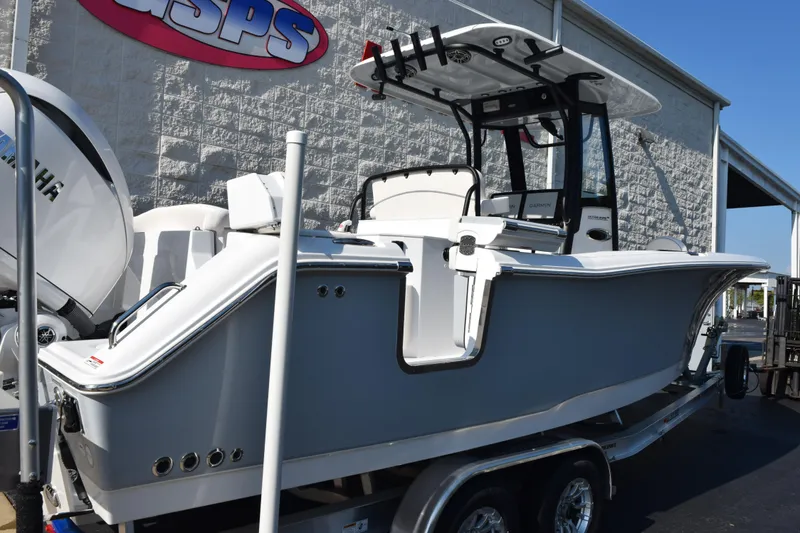 Slide: The Image of 2026 Sea Hunt Ultra 275 SE boat on trailer, displayed outdoors. - 4