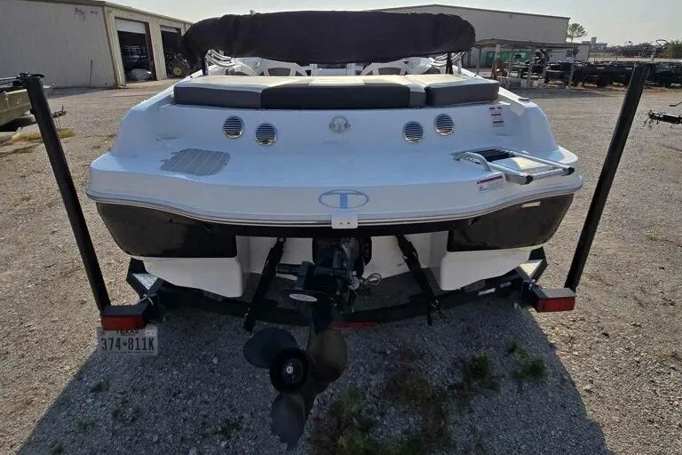 Slide: The Image of 2019 Tahoe 500 TS boat on trailer, rear view in outdoor setting. - 3