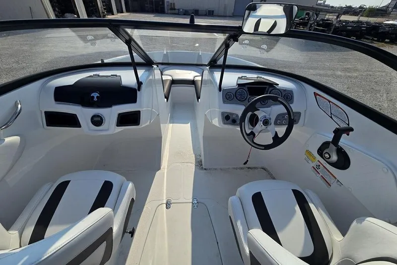 Slide: The Image of 2019 Tahoe 500 TS boat interior with steering wheel and dashboard controls. - 4
