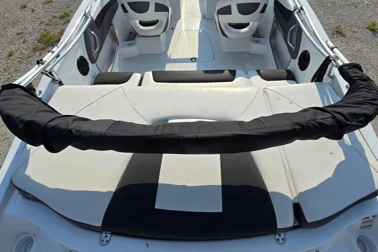Slide: The Image of 2019 Tahoe 500 TS boat interior with cushioned seating and sleek design. - 5