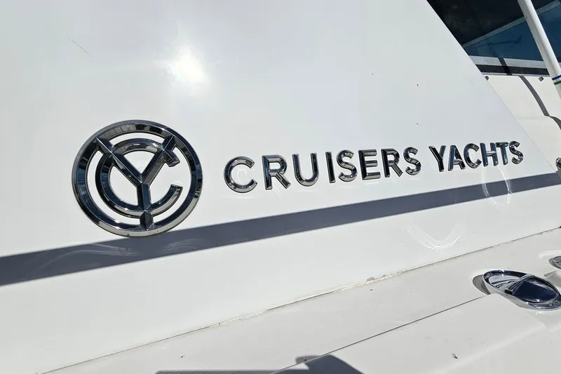 Slide: The Image of 1995 Cruisers Yachts 3775 Esprit logo on white yacht exterior. - 36