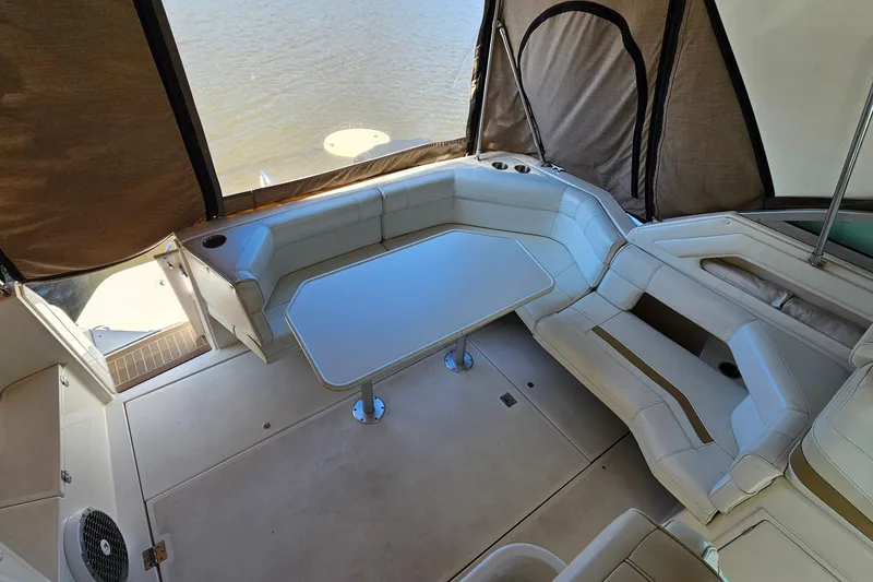 Slide: The Image of Interior of 1995 Cruisers Yachts 3775 Esprit with seating and table. - 5