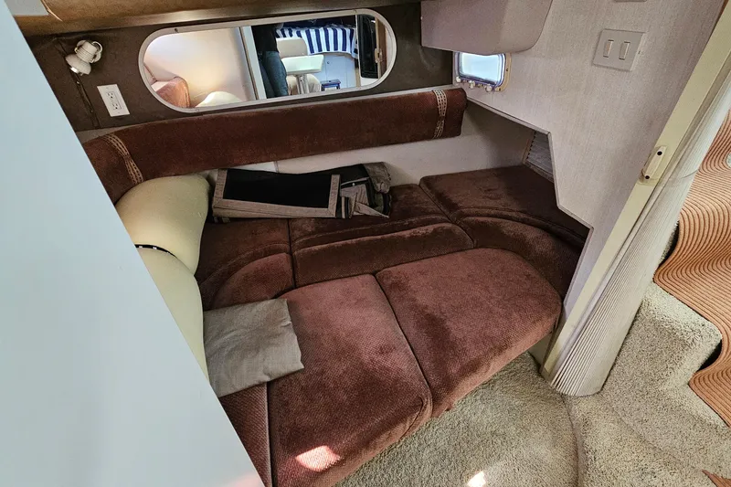 Slide: The Image of Interior of 1995 Cruisers Yachts 3775 Esprit with cozy seating and soft lighting. - 27
