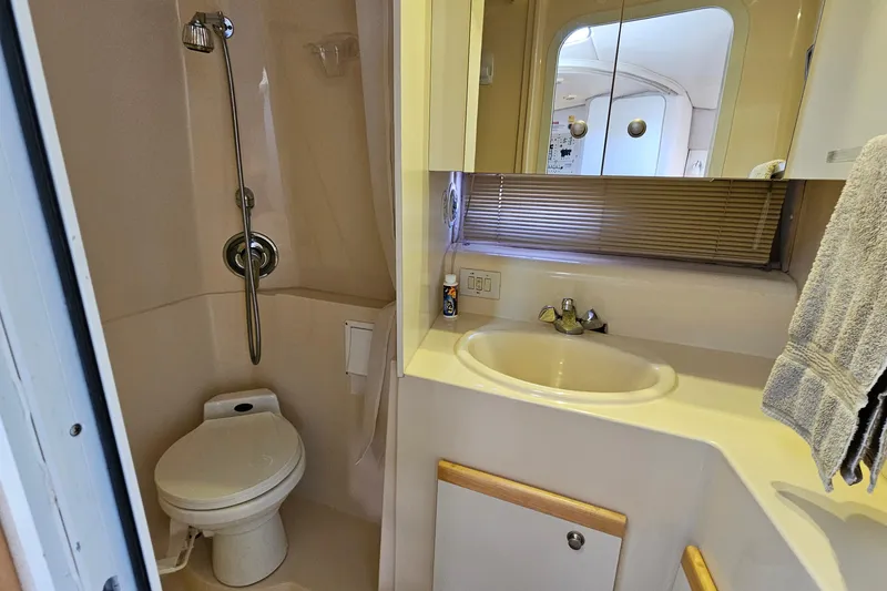 Slide: The Image of Bathroom interior of 1995 Cruisers Yachts 3775 Esprit with shower, toilet, and sink. - 28