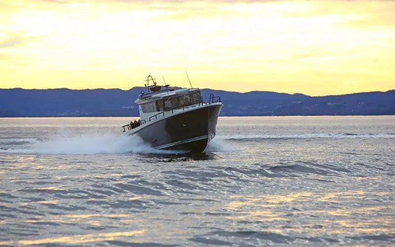 Slide: The Image of Modern kitchen area in 2019 Sargo 36 Explorer boat with stove and sink. - 12