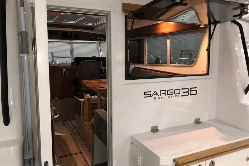 Slide: The Image of Top view of 2019 Sargo 36 Explorer boat layout with wooden deck. - 16