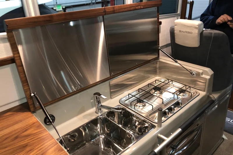 Slide: The Image of Certified Professional Yacht Broker logo with gold lettering and a star. - 22