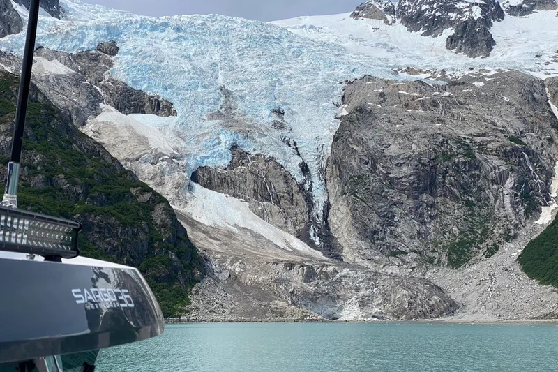 Slide: The Image of Open cabinet with fridge in 2019 Sargo 36 Explorer boat interior. - 8