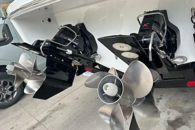 Slide: The Image of 2015 Formula 310 Sun Sport boat with dual propellers and outboard motors. - 14