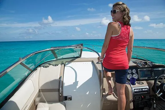 Slide: The Image of Manufacturer Provided Image: Woman enjoying the view on a 2015 Formula 310 Sun Sport boat. - 16