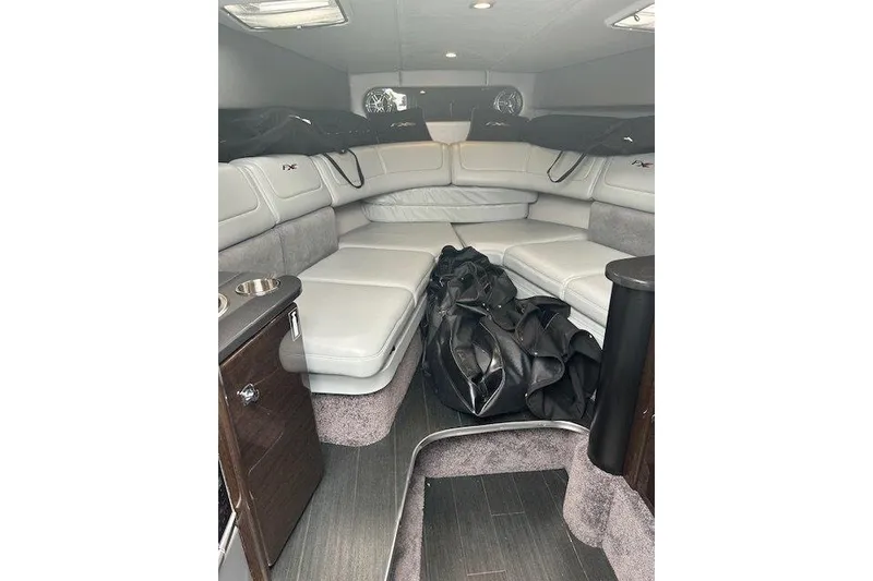 Slide: The Image of 2015 Formula 310 Sun Sport interior with plush seating and modern design. - 18