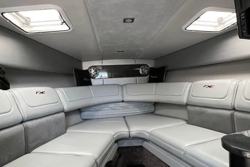 Slide: The Image of 2015 Formula 310 Sun Sport cabin interior with plush seating and modern design. - 20