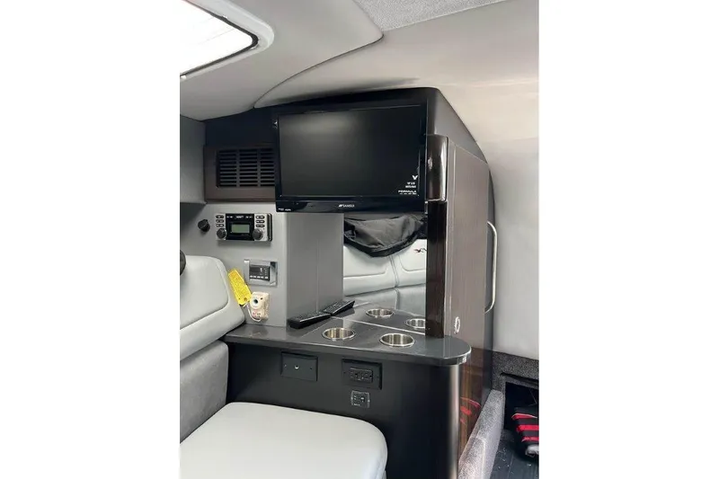 Slide: The Image of Interior of 2015 Formula 310 Sun Sport with TV and seating area. - 23