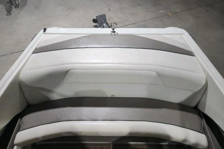 Slide: The Image of Rear seating area of a 1998 Cobalt 220 boat with gray and white upholstery. - 10