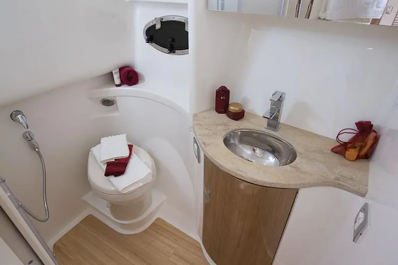 Slide: The Image of 2014 Formula 37 Cruiser bathroom with modern fixtures and wooden accents. - 60