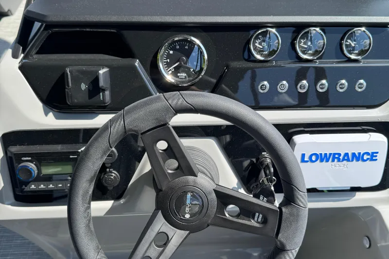 Slide: The Image of Steering console of 2026 Viaggio Lago V 20 U with gauges and Lowrance device. - 13