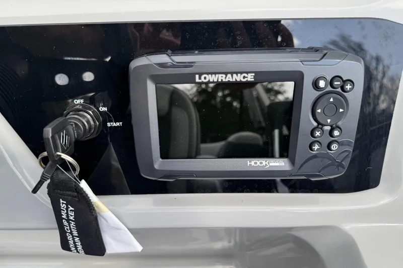 Slide: The Image of Control panel of 2026 Viaggio Lago V 20 U with Lowrance Hook Reveal display. - 15