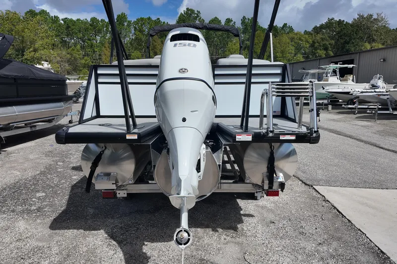 Slide: The Image of 2026 Viaggio Lago V 20 U pontoon boat with powerful outboard motor, parked outdoors. - 8