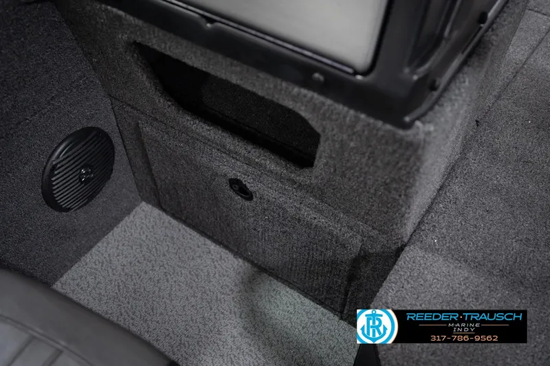 Slide: The Image of 2026 Lund 1775 Impact XS interior with speaker and storage compartment. - 27