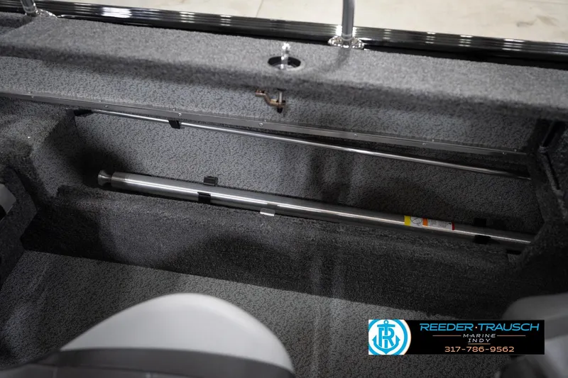 Slide: The Image of Interior view of 2026 Lund 1775 Impact XS boat storage compartment. - 30