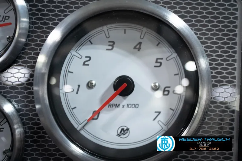 Slide: The Image of Tachometer of 2026 Lund 1775 Impact XS boat, displaying RPM with hexagonal background. - 41