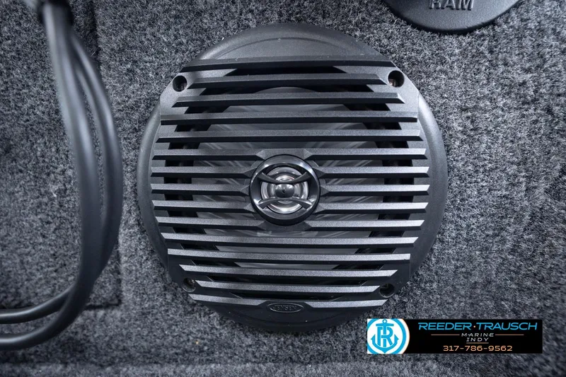Slide: The Image of Close-up of a speaker in a 2026 Lund 1775 Impact XS boat interior. - 45