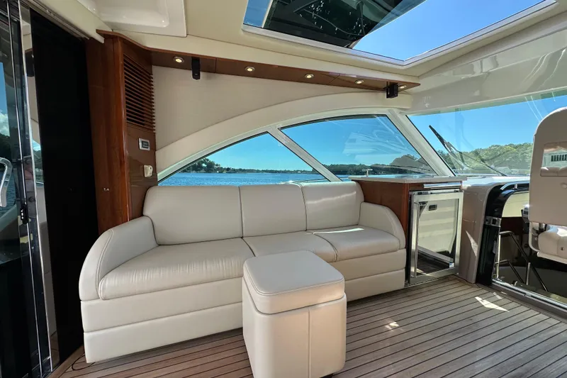 Slide: The Image of Luxurious interior of 2009 Sea Ray 60 Sundancer yacht with leather seating and scenic view. - 10