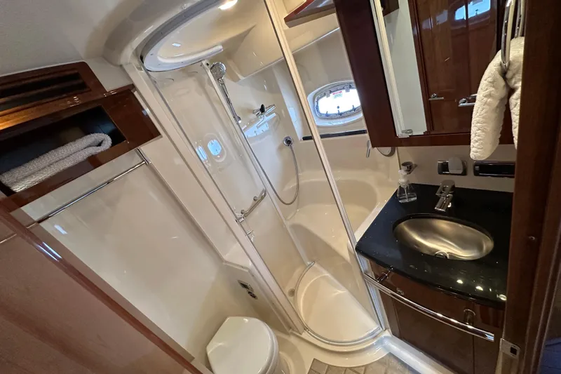 Slide: The Image of Luxurious bathroom in 2009 Sea Ray 60 Sundancer yacht with shower and sink. - 33