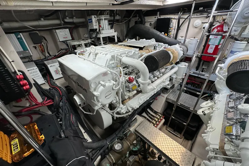 Slide: The Image of Engine room of 2009 Sea Ray 60 Sundancer yacht, featuring advanced machinery and equipment. - 39