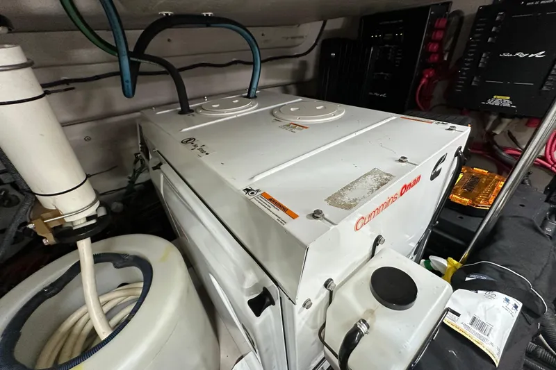 Slide: The Image of Engine room of 2009 Sea Ray 60 Sundancer with Cummins Onan generator. - 41