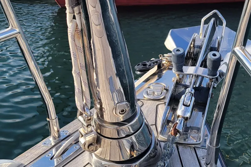 Slide: The Image of Deck of 2018 Nautor Swan 54 yacht with polished metal fittings and ropes. - 11