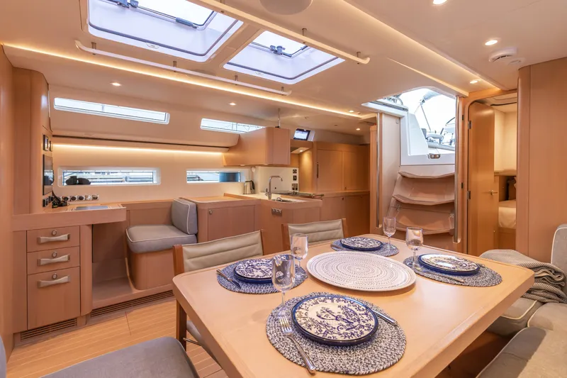 Slide: The Image of Luxurious interior of 2018 Nautor Swan 54 yacht with elegant dining area and modern kitchen. - 18