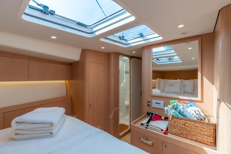 Slide: The Image of Luxurious cabin interior of 2018 Nautor Swan 54 yacht with skylights and modern amenities. - 24