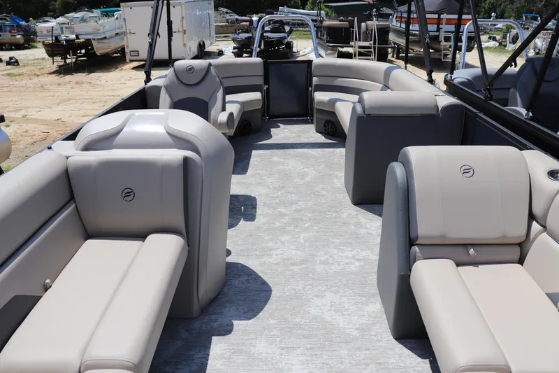 Slide: The Image of 2025 Flagship Freedom 22 CU Tritoon with spacious seating and modern design. - 1