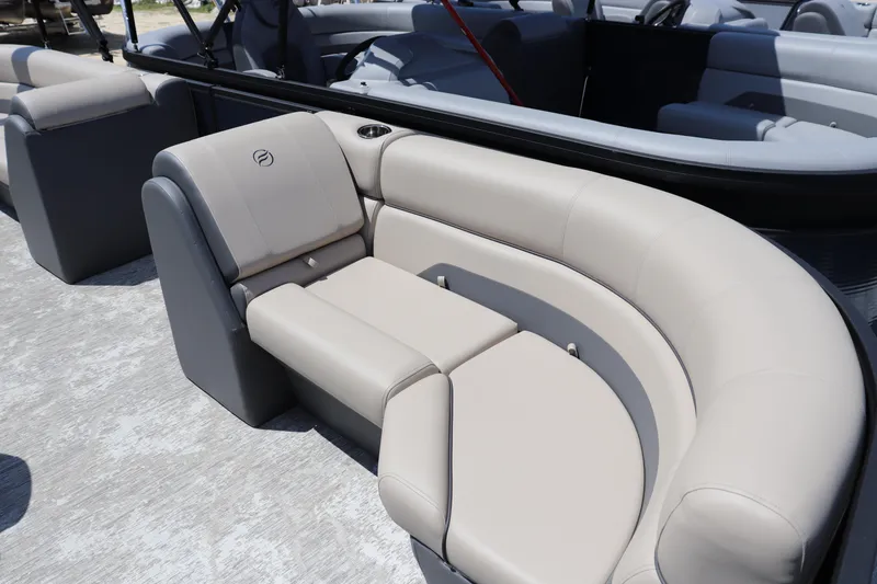 Slide: The Image of Luxurious seating on 2025 Flagship Freedom 22 CU Tritoon boat, featuring elegant beige upholstery. - 3