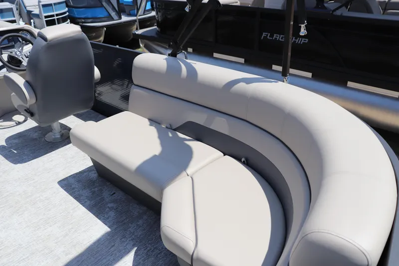 Slide: The Image of 2025 Flagship Freedom 22 CU Tritoon with luxurious seating and modern design. - 7