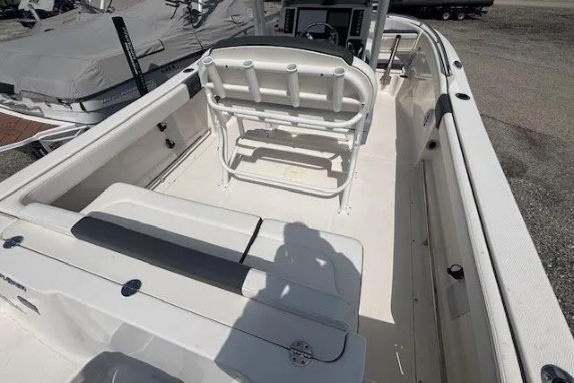 Slide: The Image of 2022 Robalo R222 Explorer boat interior with seating and console. - 16