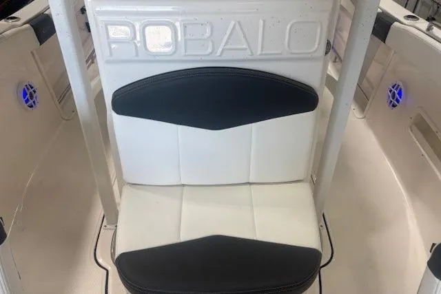 Slide: The Image of 2022 Robalo R222 Explorer boat seat with black and white upholstery. - 20
