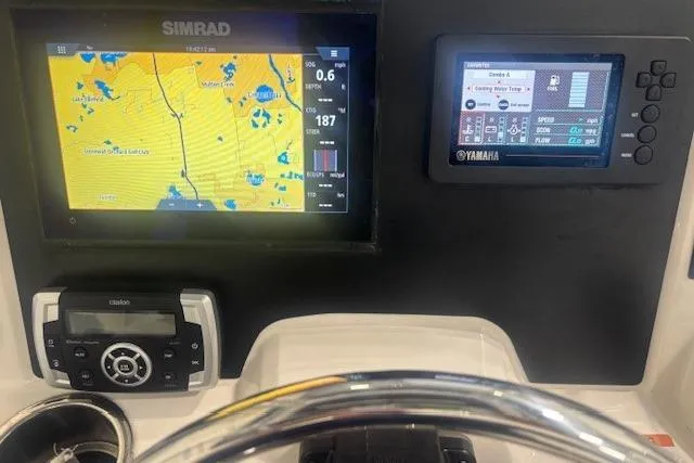 Slide: The Image of Dashboard of 2022 Robalo R222 Explorer with Simrad and Yamaha displays. - 32