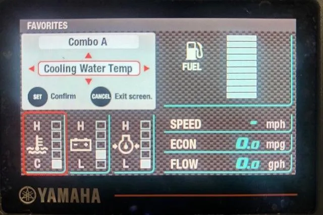 Slide: The Image of Yamaha display showing cooling water temperature and fuel metrics on a 2022 Robalo R222 Explorer. - 33