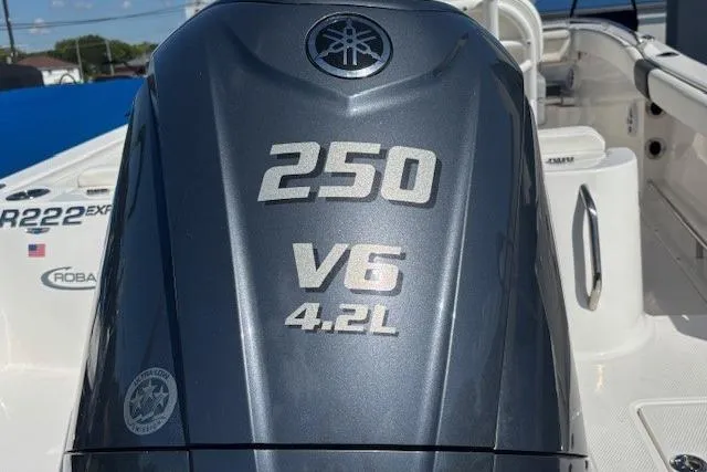 Slide: The Image of 2022 Robalo R222 Explorer with Yamaha 250 V6 4.2L engine, close-up view. - 4
