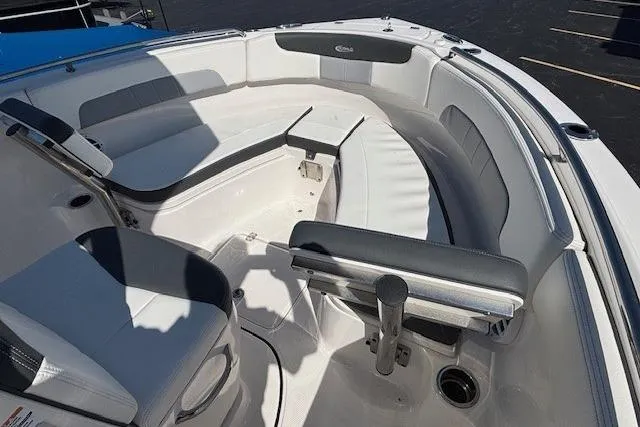 Slide: The Image of 2022 Robalo R222 Explorer boat interior with spacious seating and modern design. - 45