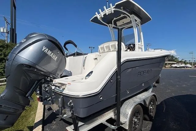 Slide: The Image of 2022 Robalo R222 Explorer boat with Yamaha engine on a trailer. - 48