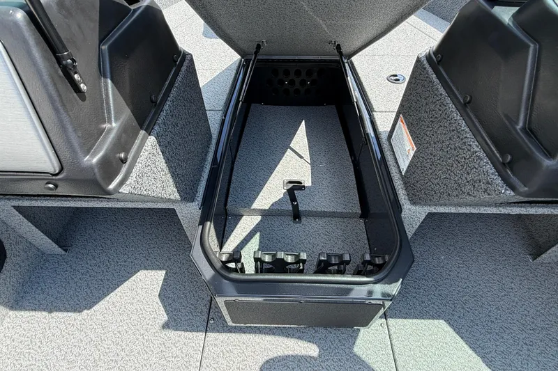 Slide: The Image of Open storage compartment in 2025 Lund 2075 Impact XS boat interior. - 19
