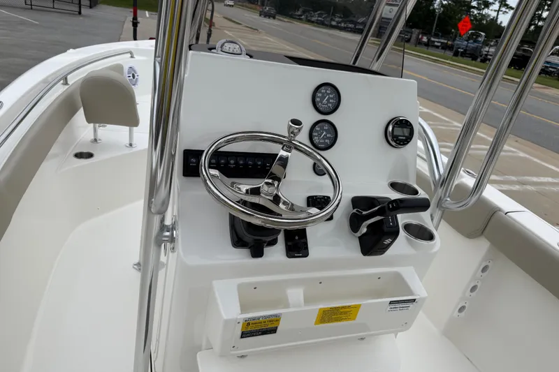 Slide: The Image of 2026 Key West 203 FS boat console with steering wheel and controls. - 15