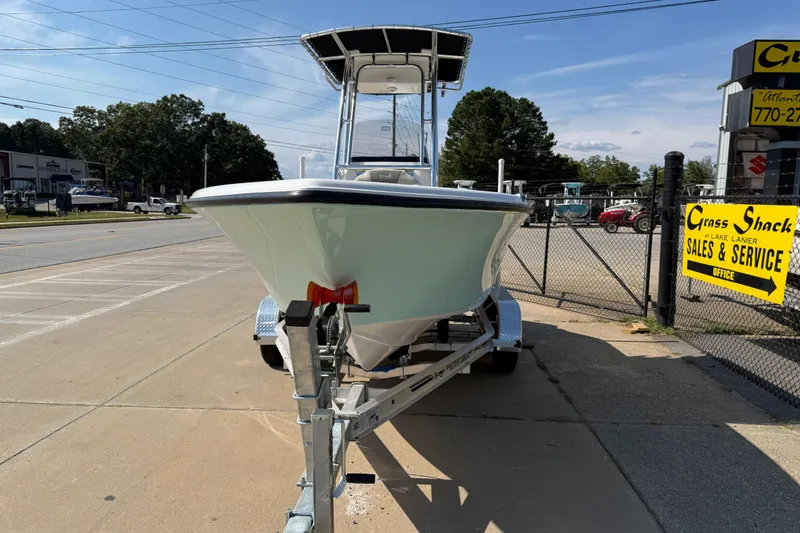Slide: The Image of 2026 Key West 203 FS boat on trailer at sales and service lot. - 2