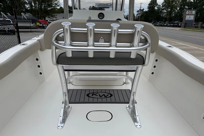 Slide: The Image of 2026 Key West 203 FS boat interior with rod holders and seating. - 21