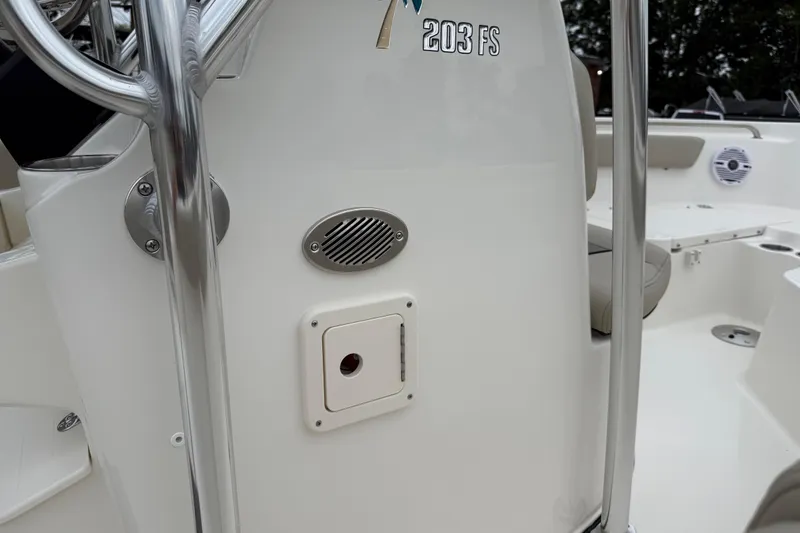 Slide: The Image of 2026 Key West 203 FS boat interior with speaker and control panel. - 24